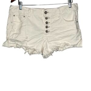 Free People white cut off denim shorts button fly raw distressed hem size 28